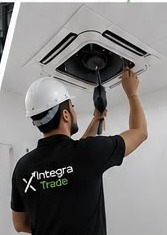 Technician servicing AC unit